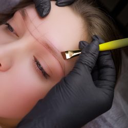 made sketch on the model's eyebrows before the permanent makeup procedure. PMU Procedure, Permanent Eyebrow Makeup.